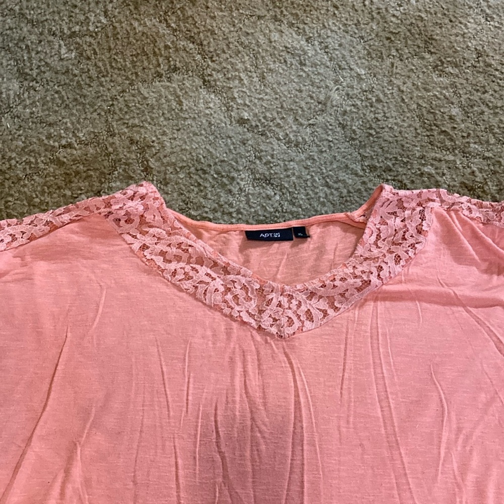 Pink shirt with lace accents